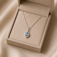 Aquamarine Blue Teardrop Halo Pendant